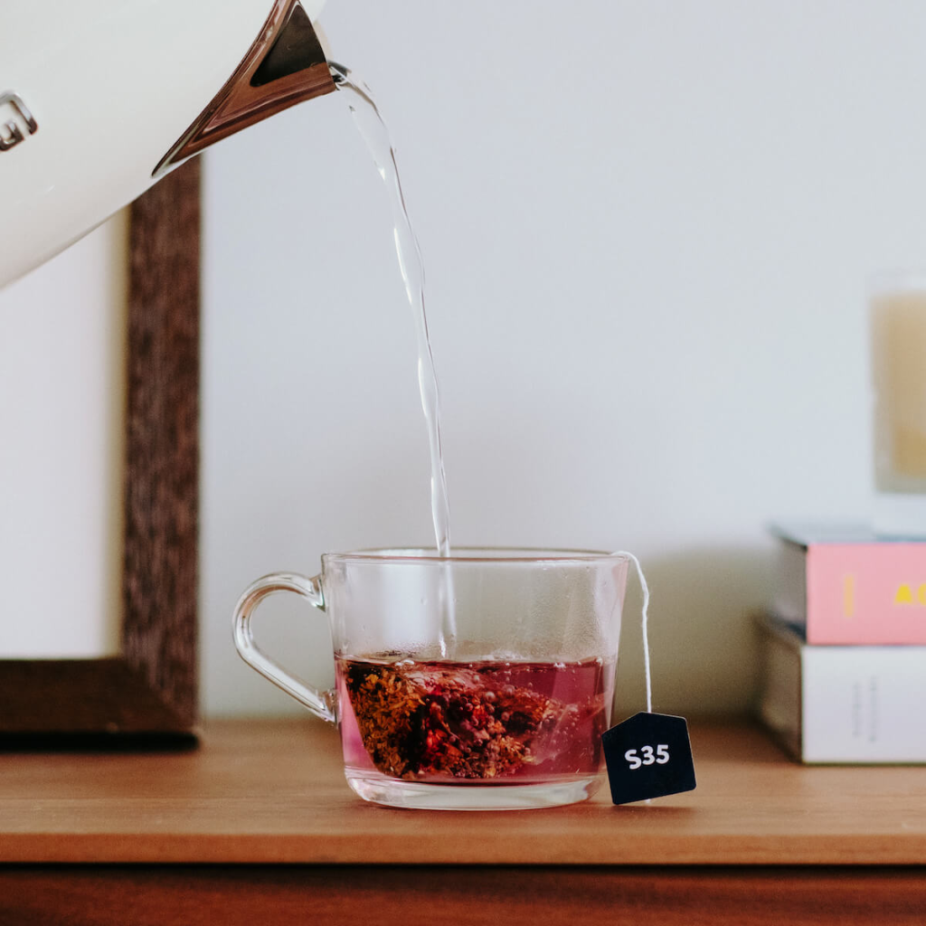 S35 Shroom tea in a glass cup. 